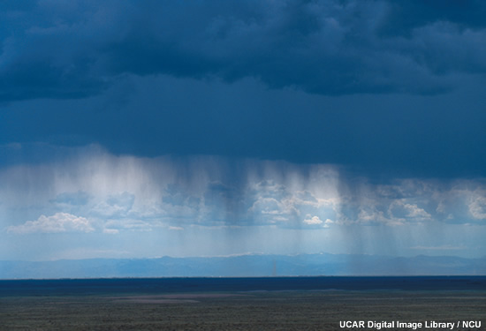 virga falling beneath clouds